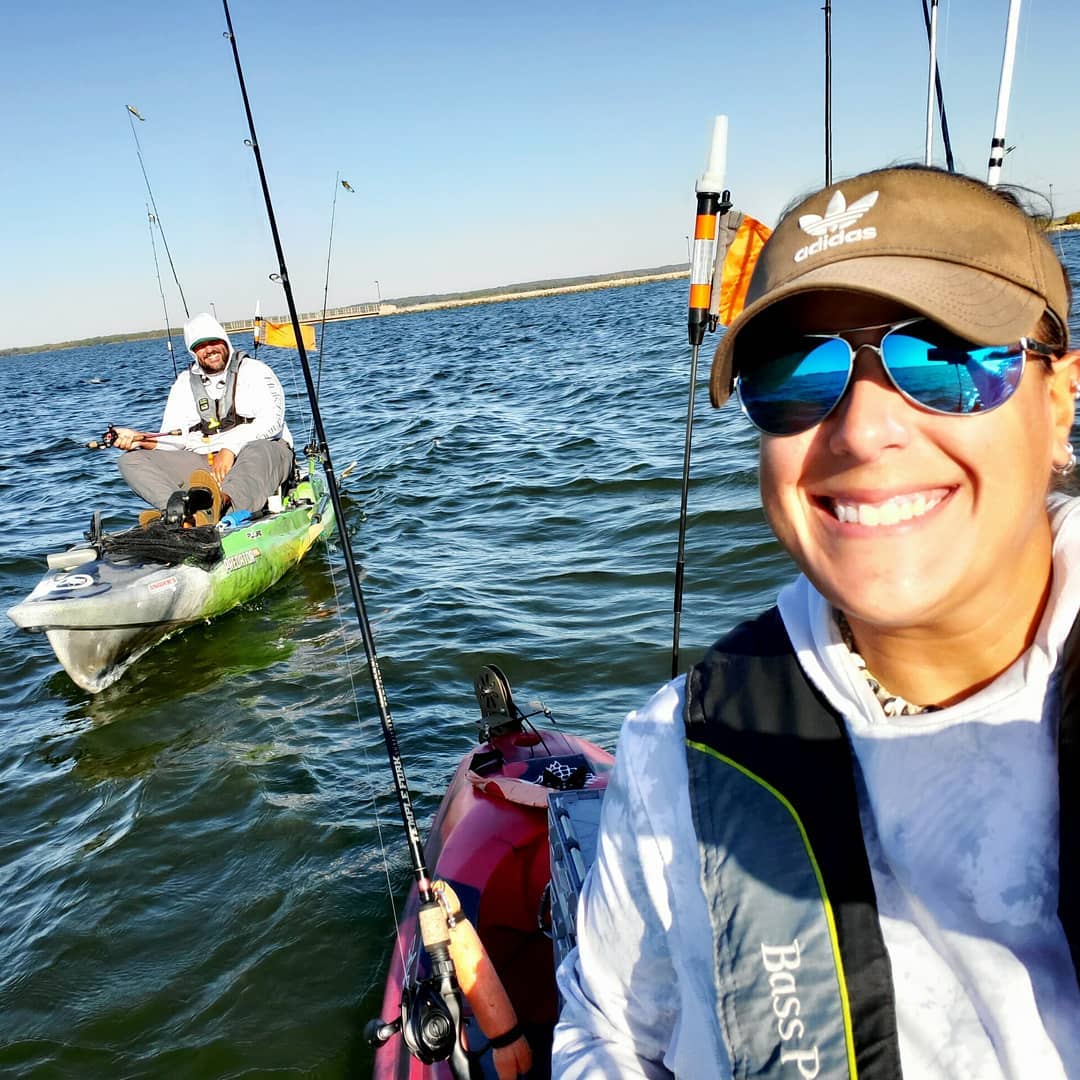 Katie and Ryan fishing on their kayaks